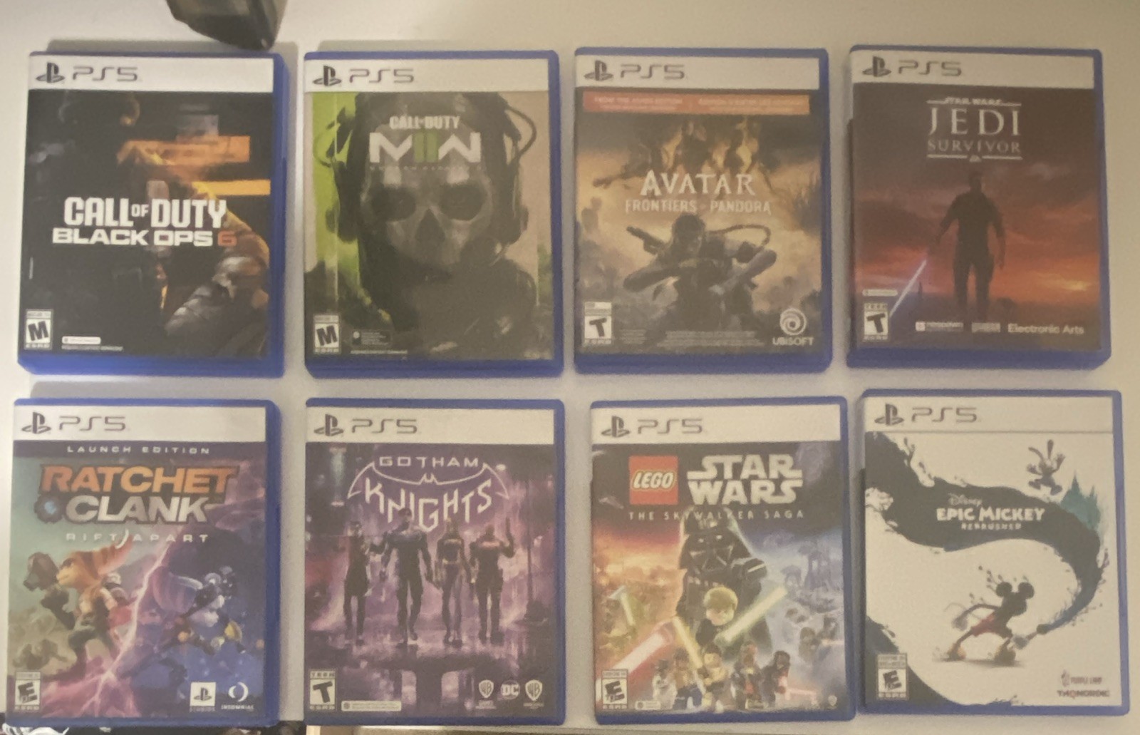 Lotto 10 giochi PS5 PlayStation 5 con custodie Call of Duty Star Wars LEGO DC Avatar foto 2