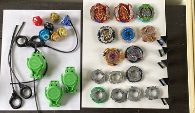 35 piece beyblade lot Tomy Hasbro And Launchers