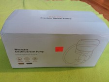 Wearable electric double breast pump. USB rechargeable. 24mm breast shields.