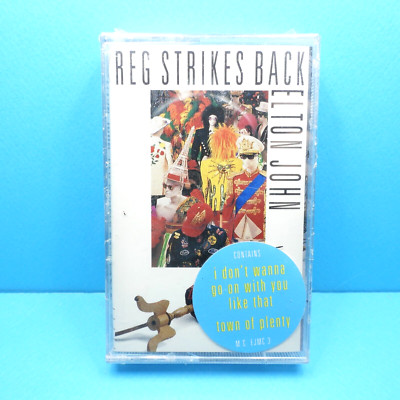   MC - ELTON JOHN - Reg Strikes Back * THE ROCKET RECORD COMPANY *SEALED* 1988