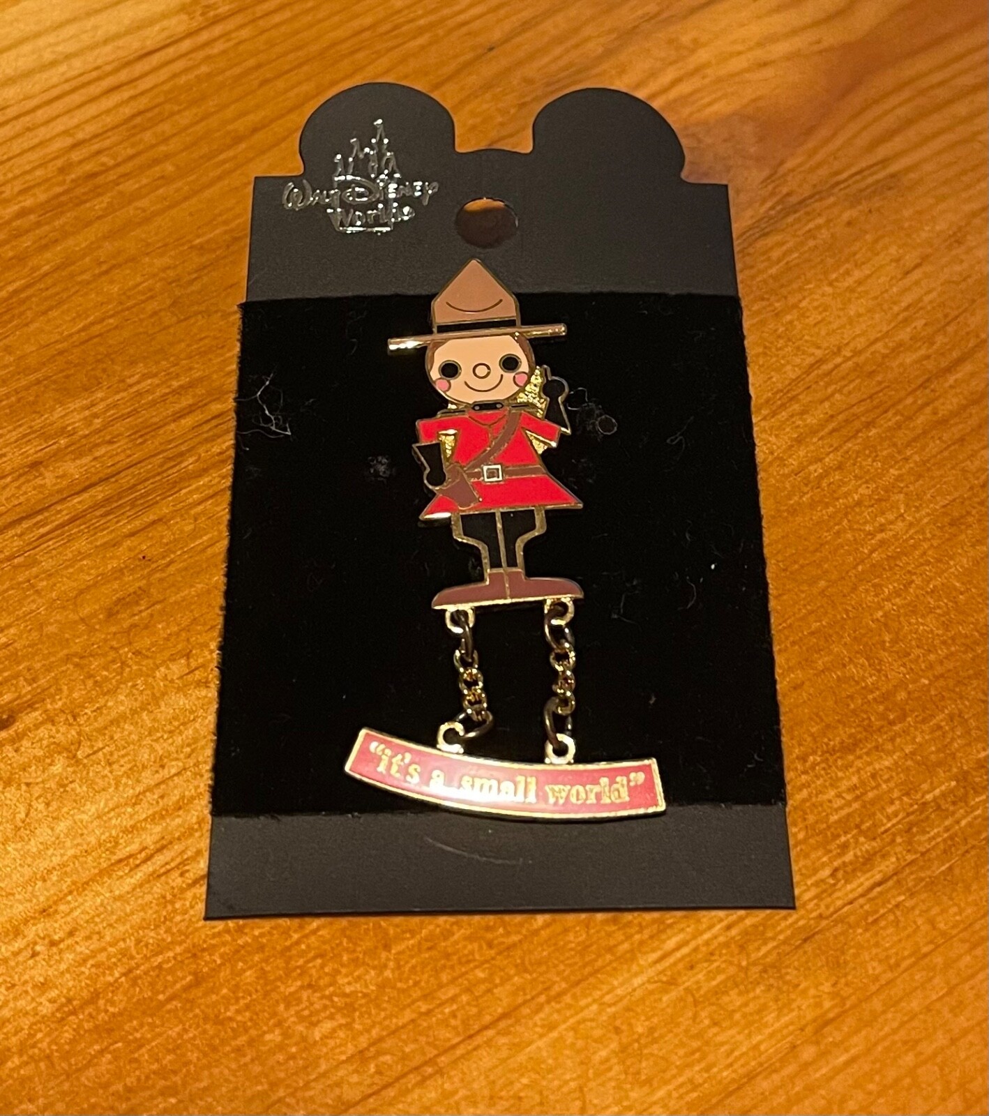 Canadian Mounty Disney toggle pin “It’s a small world” pin is new and flawless