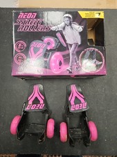 Yvolution Neon Street Rollers in pink, which are clip-on heel skates