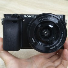 Black Sony Alpha A6000 w/16-50mm Lens Digital Camera with Accessories English