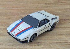 AURORA AFX TOMY BMW M1 WHITE BLUE RED SLOT CAR