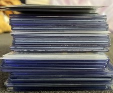 Lot de 52 cartes pokemon jeux mixtes et langues.