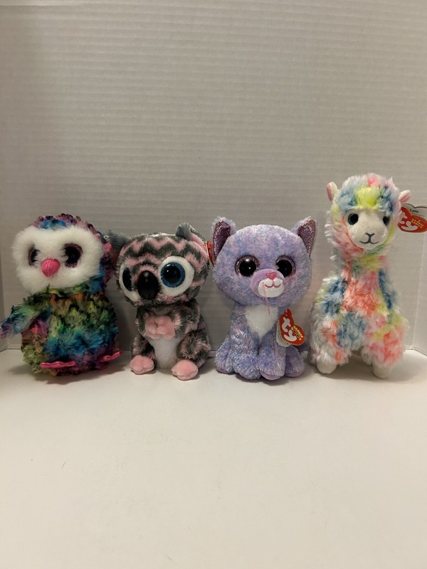 Lot of 4 TY Beanie Boo Stuff Animals (Owen, Kora, Cassidy, And Lola)