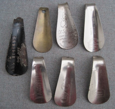 7 DIFF. METAL ADVERTISING SHOE HORNS: Dr. SCHOLLS, STACY ADAMS, CITY CLUB, ETC.
