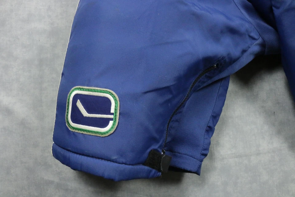 Pantalones de hockey Vancouver Canucks usados en juegos grandes Reebok MHP7000 SE NHL Foto 3 de 4