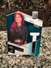 2023 Panini WWE Donruss Elite LITA Spell Bound "T" Teal Parallel No. 26 23/25