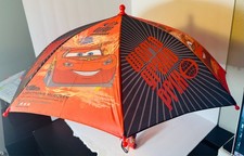 Lightning McQueen kids umbrella. Make even rainy days fun Lightly used