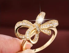 Exquisite Sparkling Zirconia Bow Ring, Elegant Statement Jewelry Piece Size 8