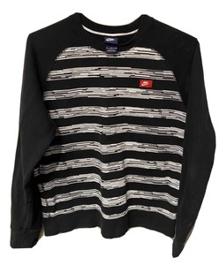 black nike crew neck with red logo