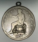 1877 Trade Potty Dollar "what you see is what you get"