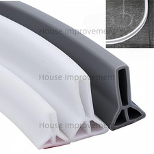 Collapsible Self-Adhesive Silicone Shower Water Barrier and Splash Guard Trim.