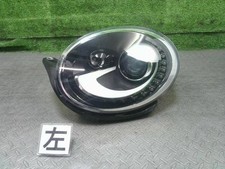 Faro proiettore sinistro