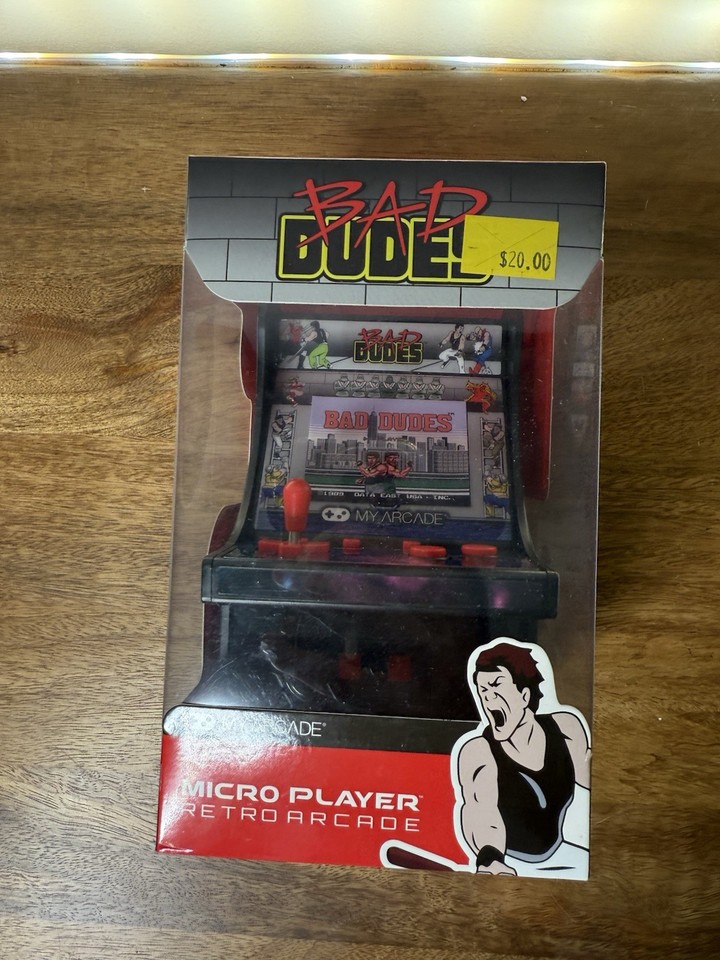 A fully playable mini arcade cabinet of the classic 1988 brawler 'Bad Dudes' — neon nostalgia that fits on a desk.