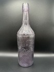 VINTAGE LAVENDER QUAKER MAID WHISKEY  PATENTED 1538 GLOW GREEN GLASS BOTTLE — photo 1
