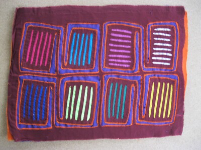 Kuna Native Hand-Stitch Panama Mola E1305 Leaning by Two Heavy Horizontal Boxes