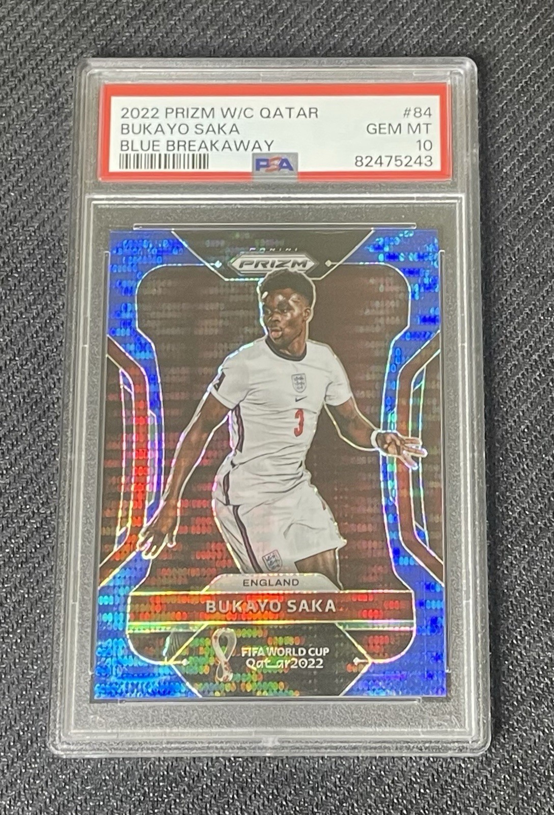 2022 Panini PRIZM Bukayo Saka World Cup Qatar Blue Breakaway /49 PSA 10 England