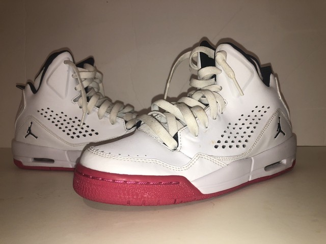 pink and white jordan flights