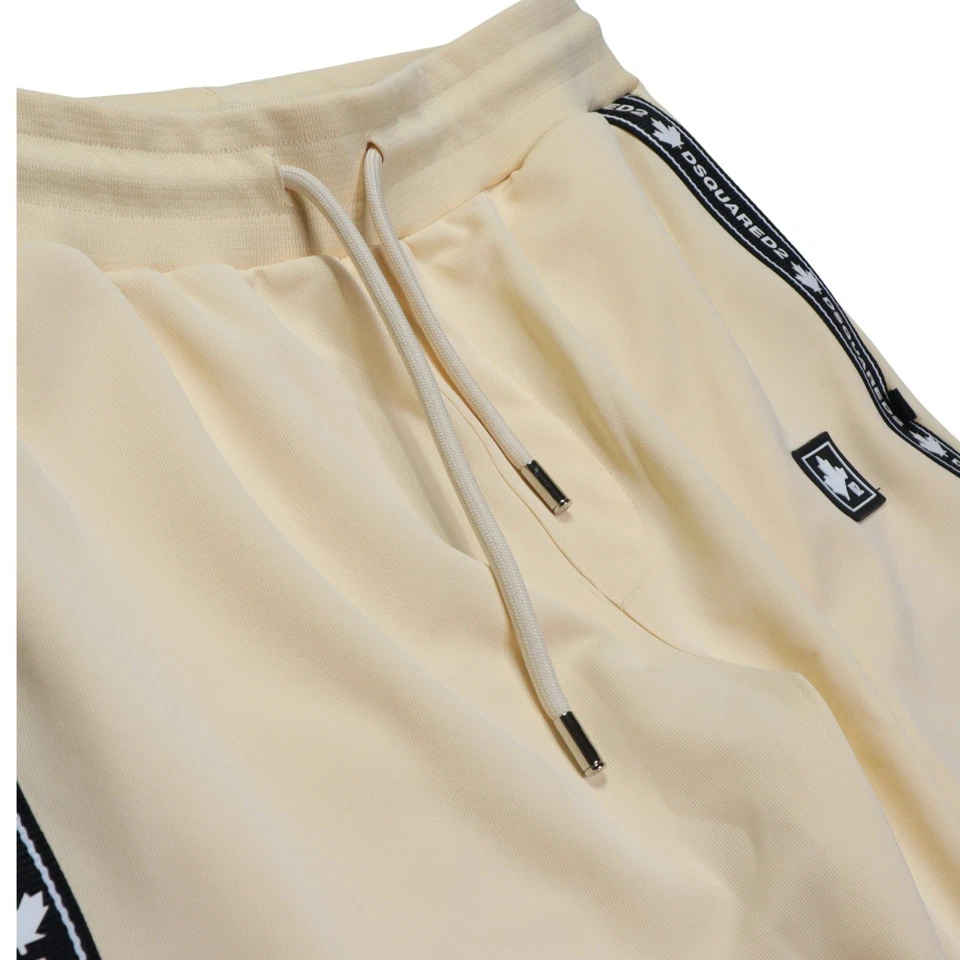 Pantalones deportivos Dsquared2 para hombre talla 2XL cremallera al tobillo crema/amarillo claro Foto 2 de 4
