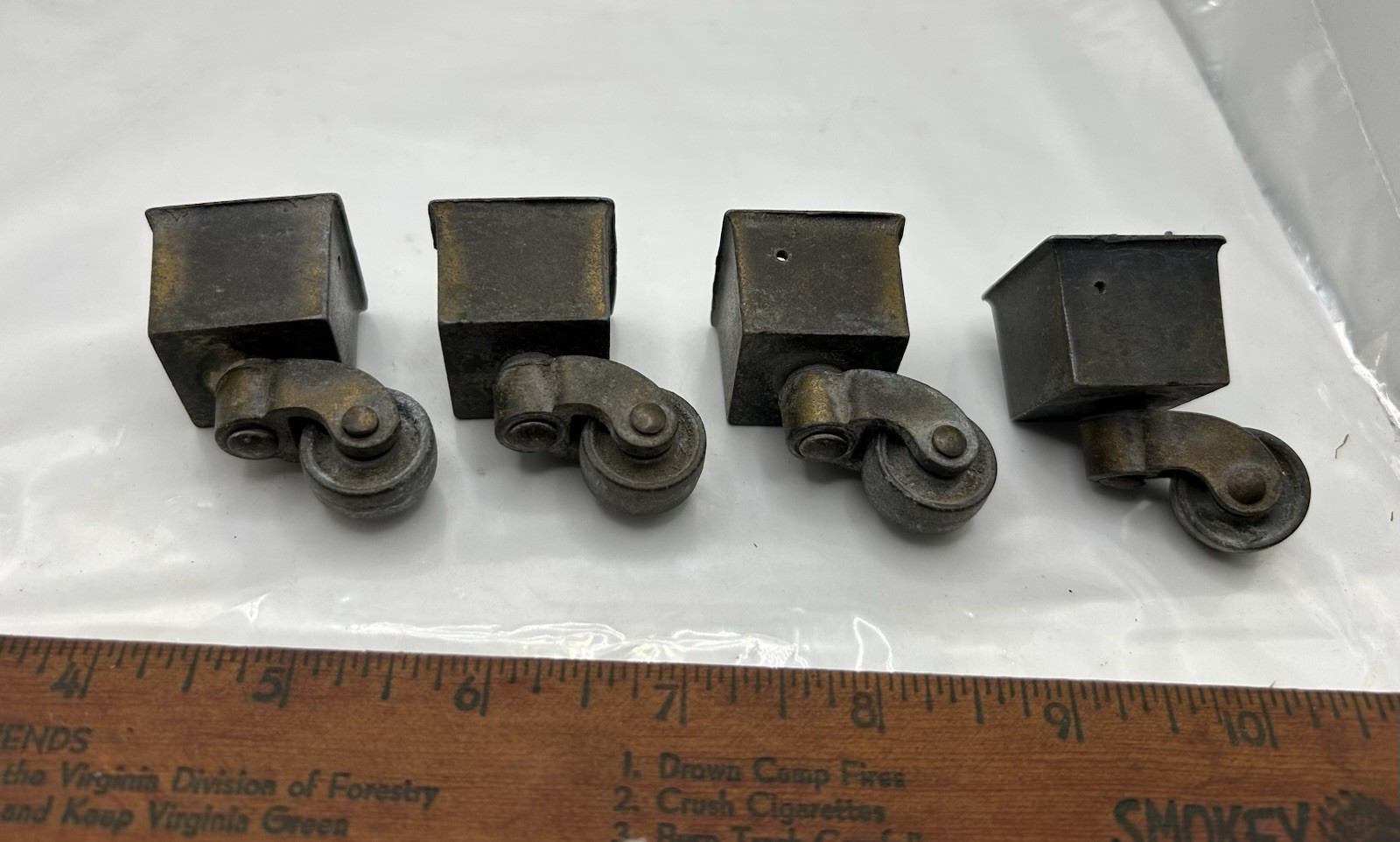 4 ANTIQUE BRASS VICTORIAN ROLLERS FOR FRONT CHAIR LEGS CASTORS