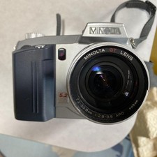 Minolta Dimage 7 Digital Camera with AC Adapter and 64MB CF Card