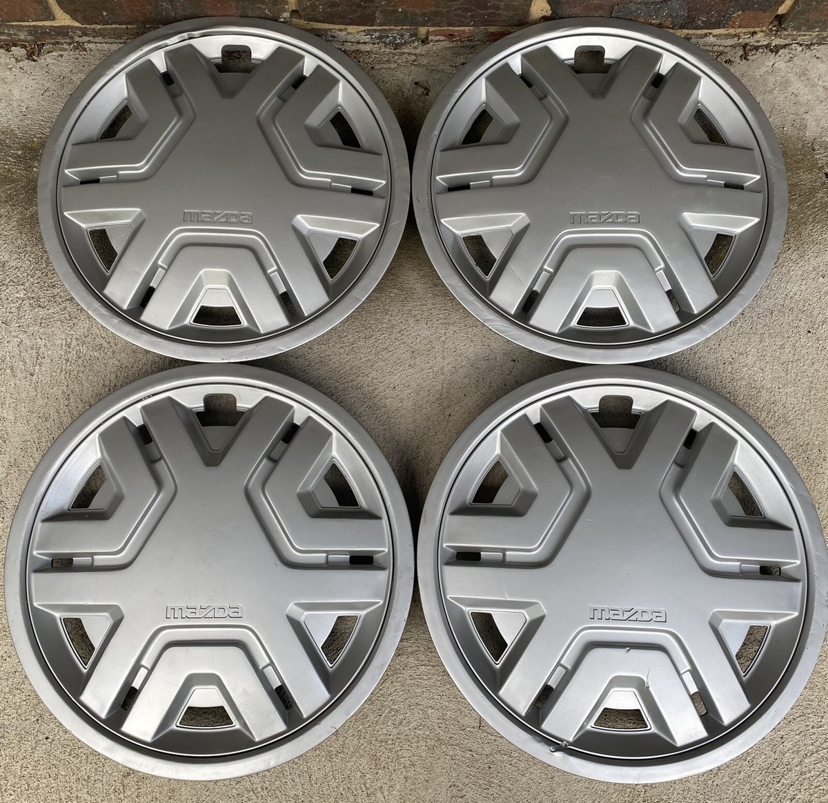 MAZDA 323 SS. 1983-1985..SET OF 4 13”Hub Caps Hubcaps Wheel Covers