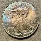 2000 Philadelphia American Eagle 1 ozt 99.9% Silver Coin - Obverse Blue Toned