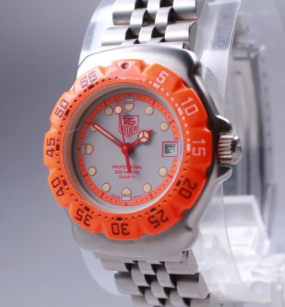 TAG Heuer Formula 1 Women's Watch 373.508 Orange Dial Date Stainless Steel New Battery