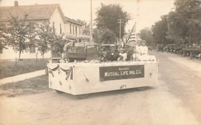 Postcard RPPC Fourth of July Parade 1917 Float Security Mutual Life Ins. Co Flag