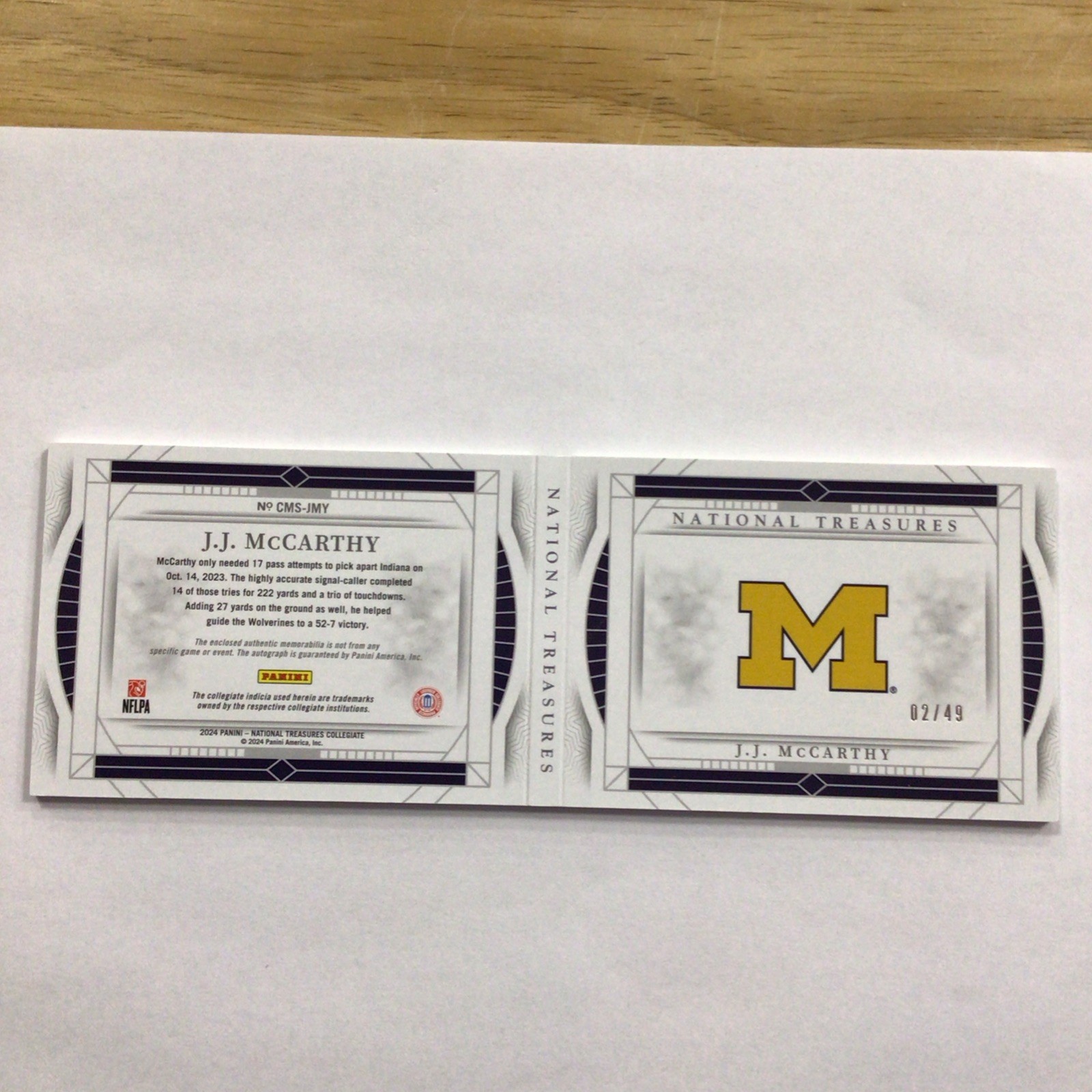 2024 Panini National Treasures Collegiate JJ McCarthy Auto Booklet /49 view 2