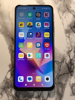 Xiaomi Redmi Note 10 5 G kurz gebraucht + 5  kostenlose noname Artikel geschenkt