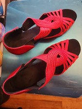 Women's Red Satin Latin Dance Shoes with a flared heel, commonly used for salsa,