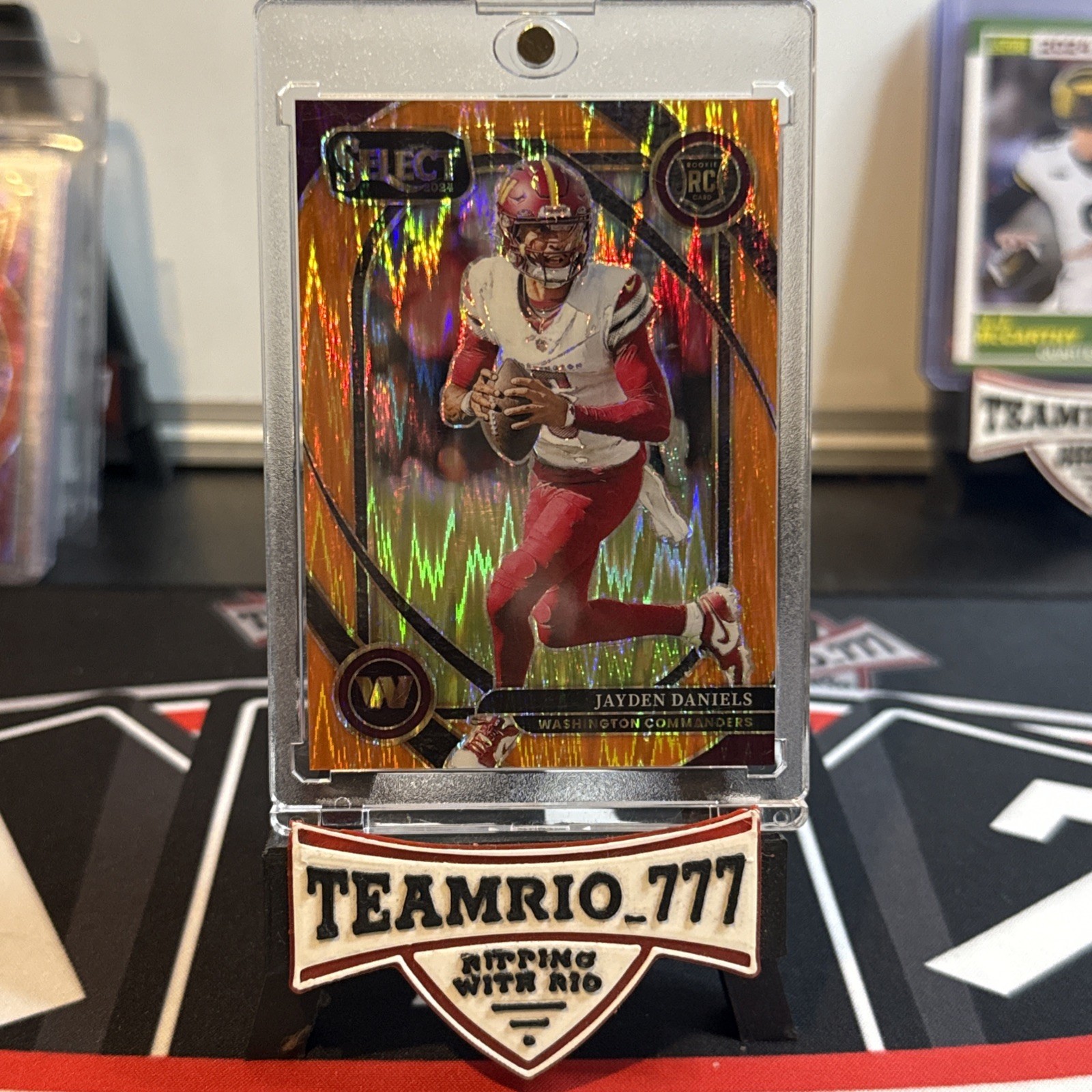 2024 Panini Select - Club Level Jayden Daniels #217 Orange Shock Prizm /399