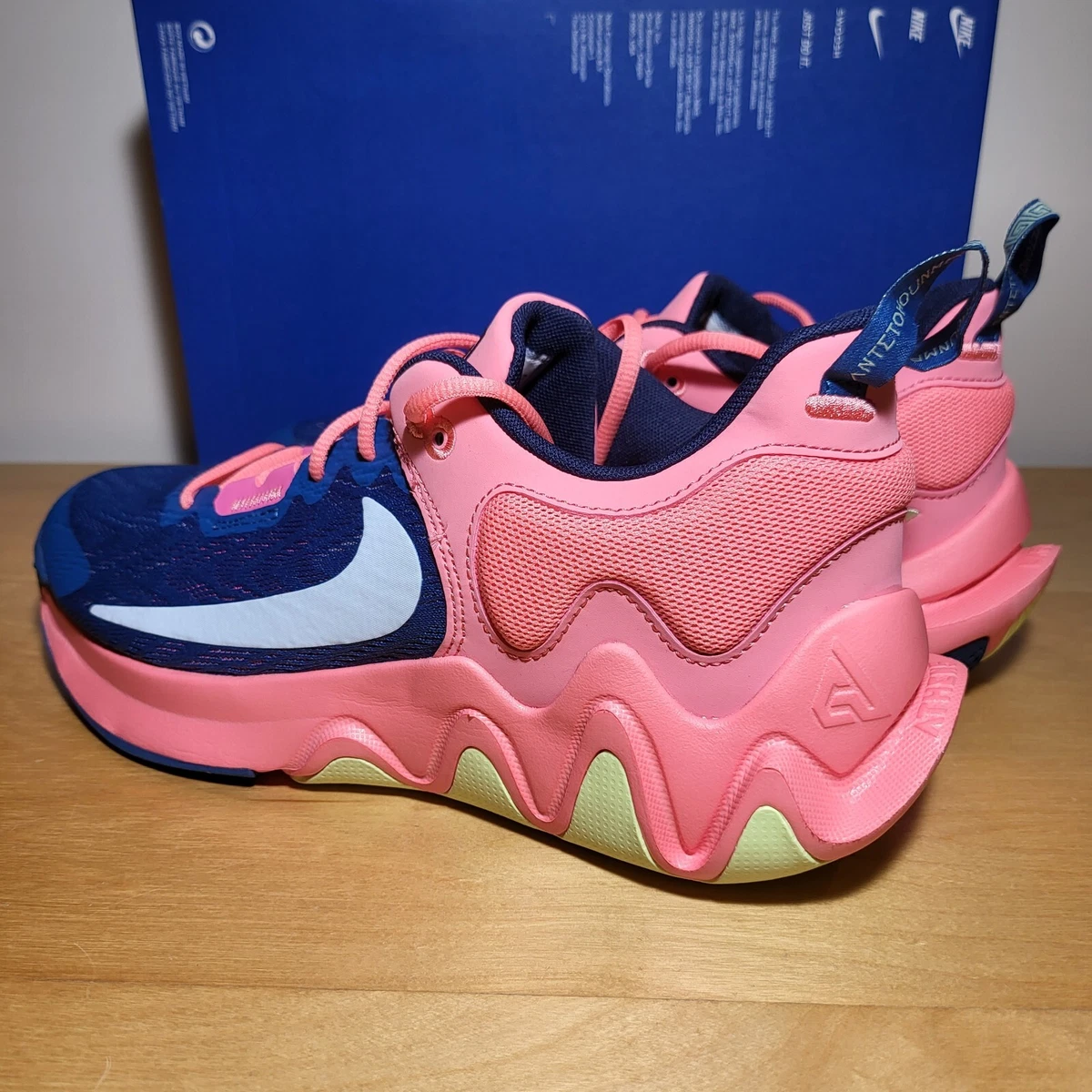Pink and hotsell navy nike shoes