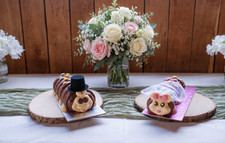 Mini hat & veil used as toppers regular size Colin the Caterpillar wedding cakes