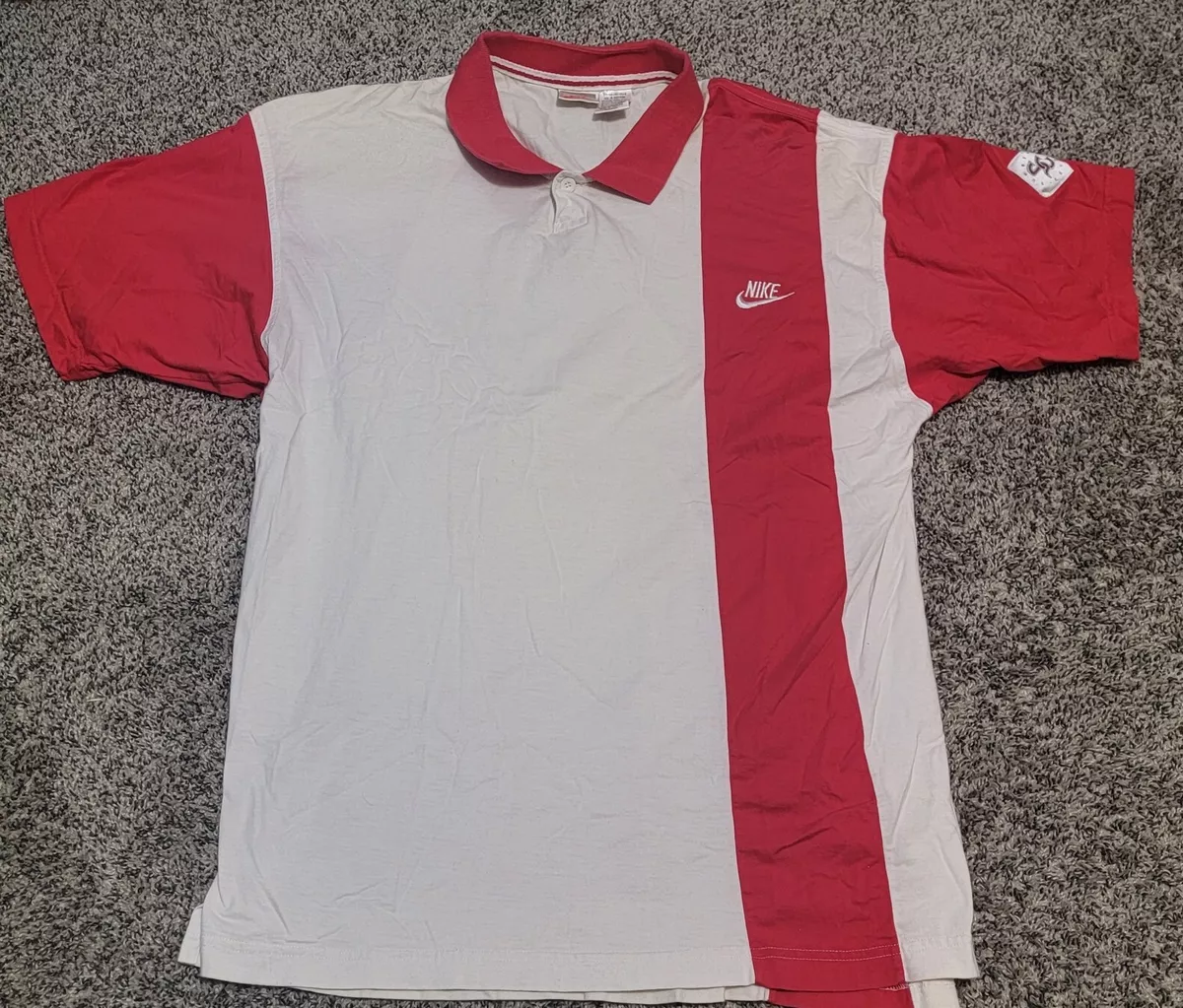 Nike supreme court polo top