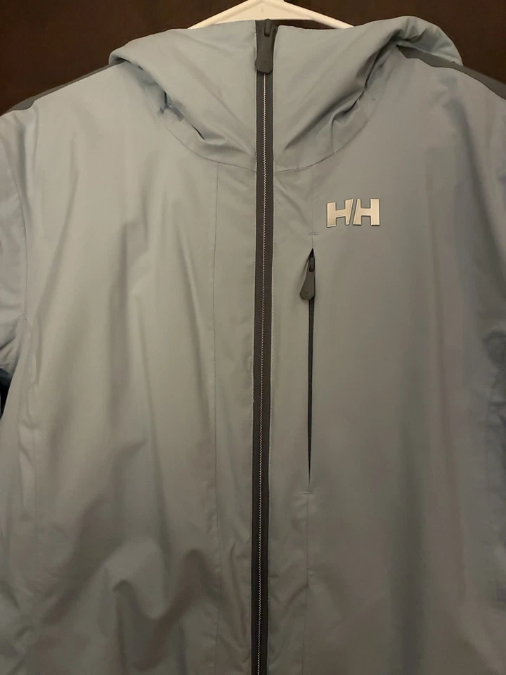 Jaqueta feminina Helly Hansen azul pó grande nova em folha nunca usada - Imagem 3 de 4