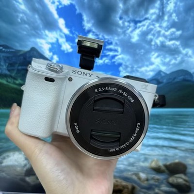 Sony Alpha α6000 24.3MP Digital SLR Camera w/ E PZ 16-50mm Power Zoom Lens White