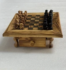 Olive Wood Chess Set with playing pieces.