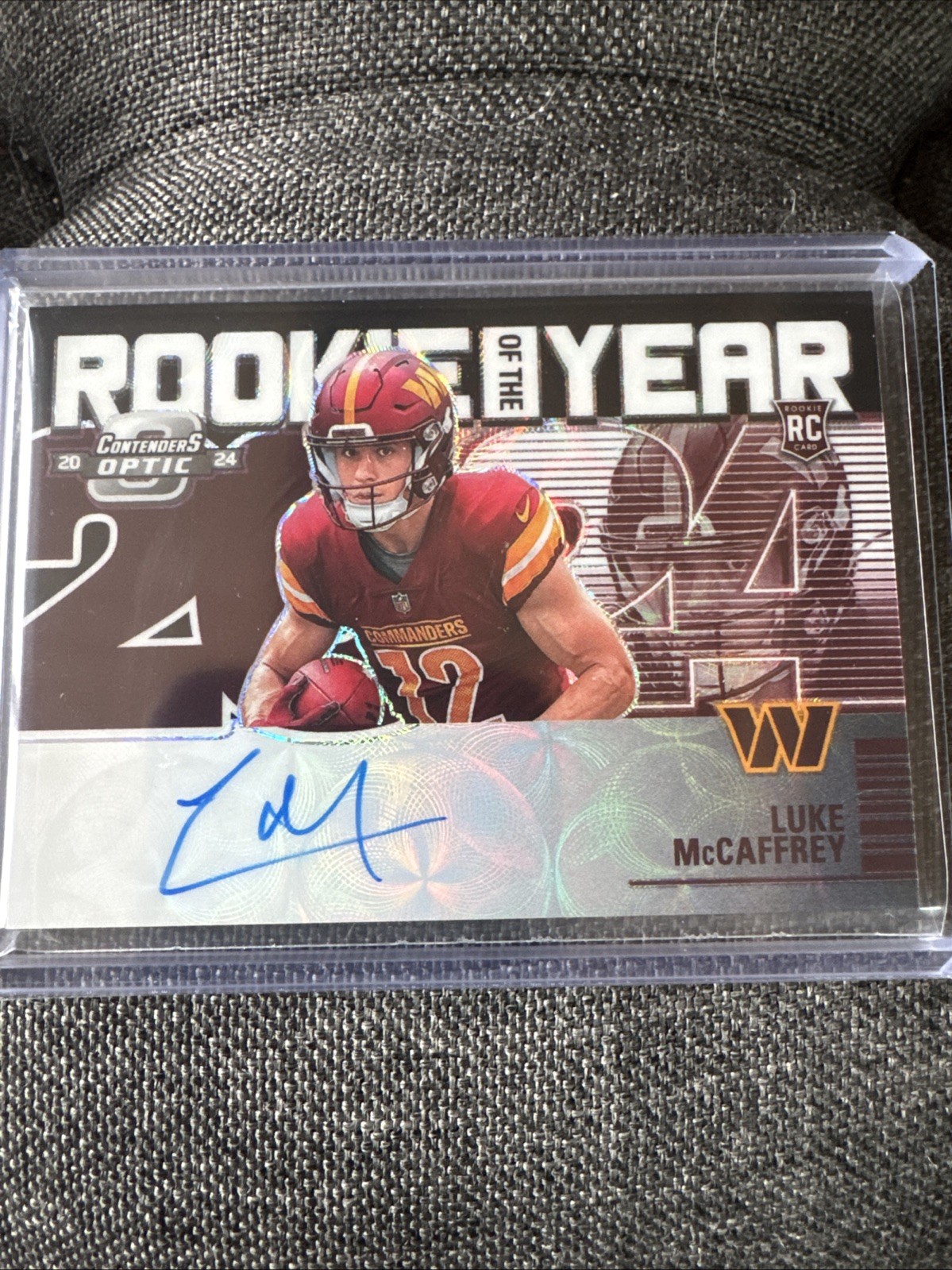 Luke McCaffrey Panini Contenders Optic Rookie of the Year Contenders Autographs #ROYLMY Base