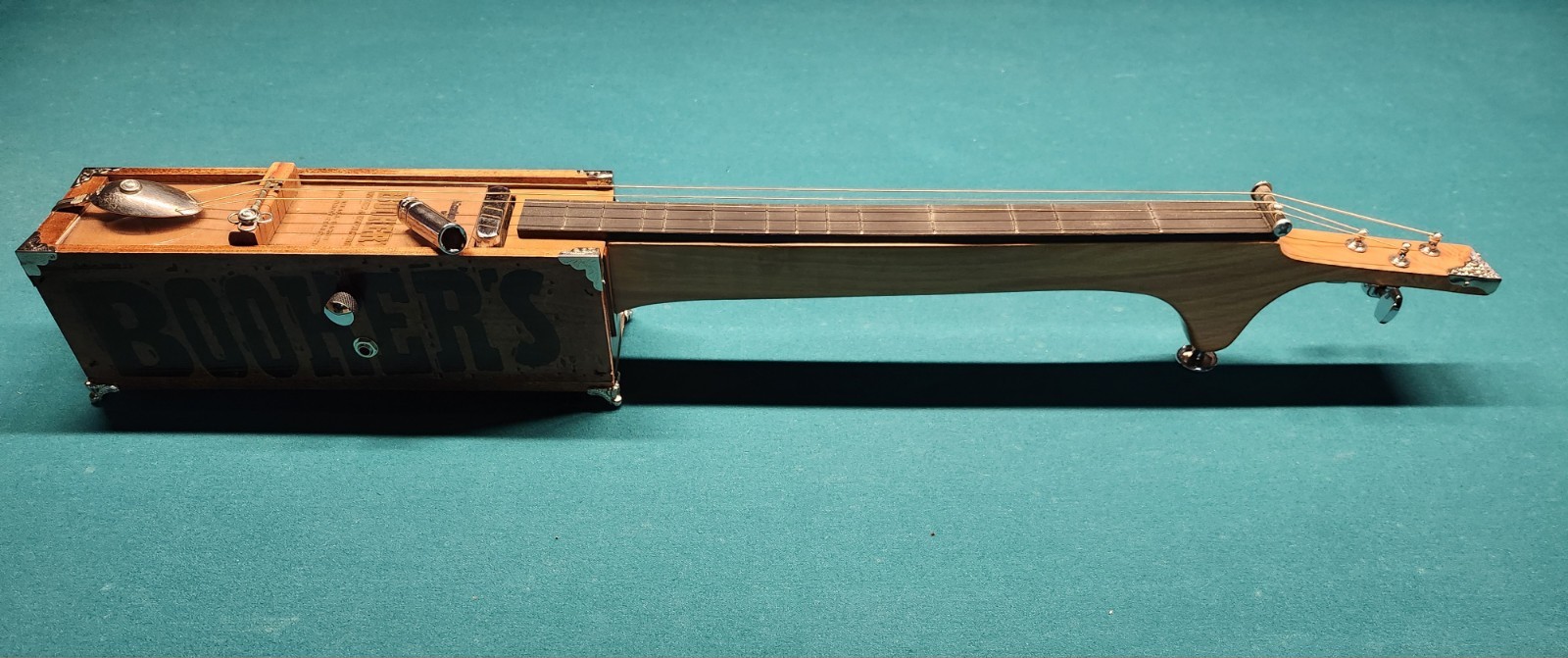 This Is A Unique Instrument  With A Diatonic  Scale. Three String Slide guitar