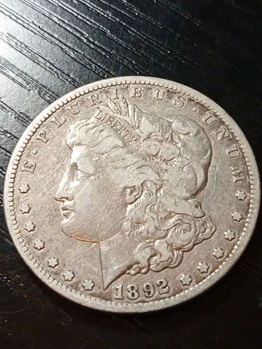 1892-CC Morgan dollar. Fine. No problems. Silver gray. No reserve.