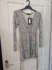 pretty little thing dress size  8.bnwt. dalmatian print.holiday.travel.party