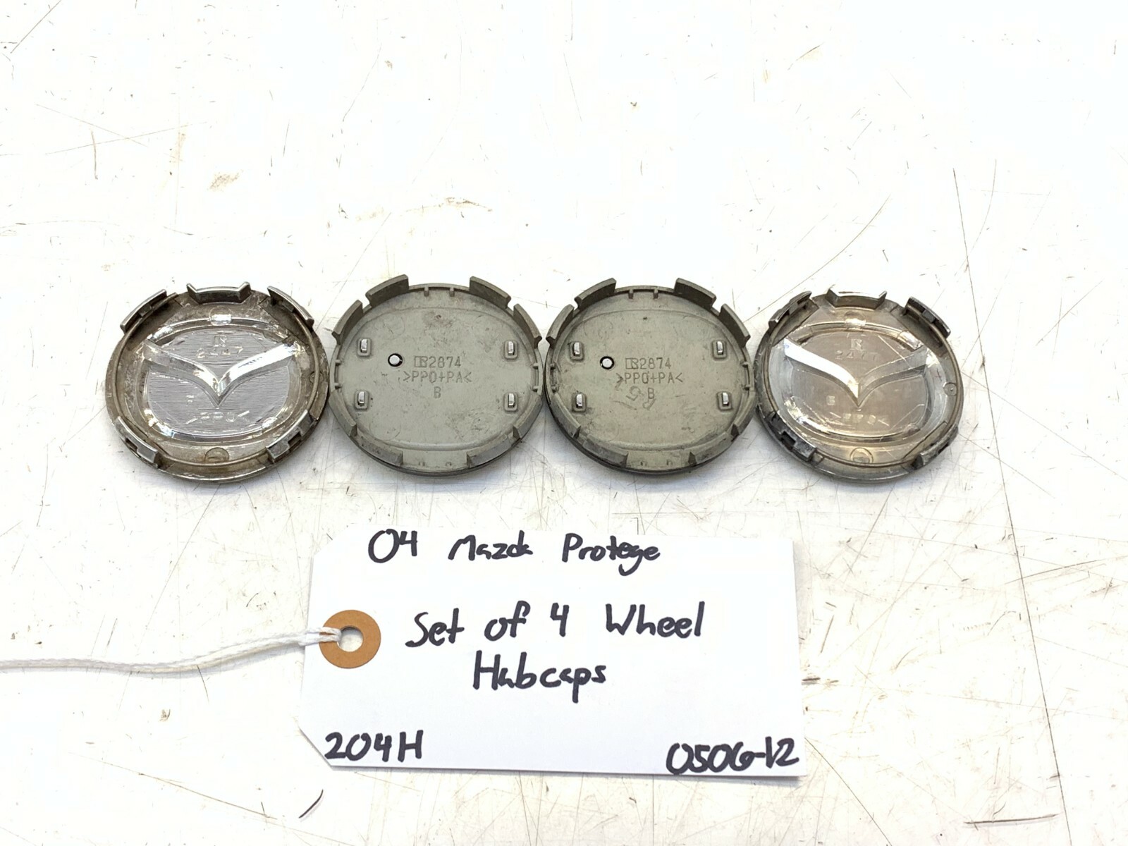 04 05 06 MAZDA PROTEGE CENTER WHEEL HUBCAPS HUB CAPS SET OF 4 OEM R2874