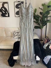 Silver beaded Prom Dress with a V-neckline and spaghetti straps size 4/5