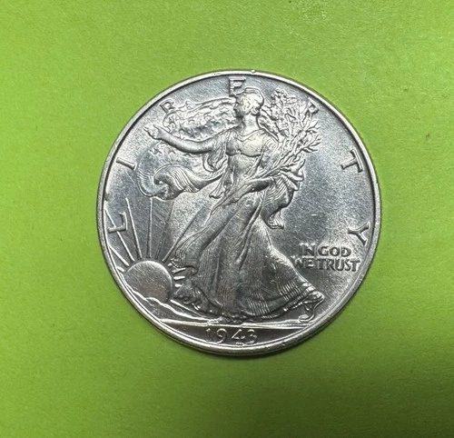 Uncirculated 1943 Philadelphia Mint Silver Walking Liberty Half Dollar.