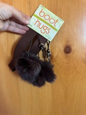 Abrazos para botas de bandals - pompones marrones - tamaño ajustable