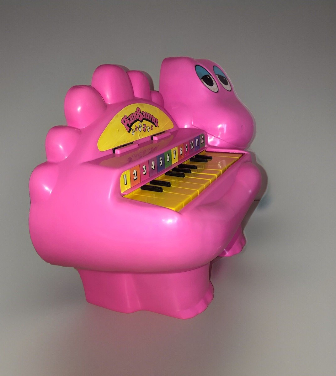 Vintage 1977 Pink Dinosaur PIANOSAURUS Kids Piano Proll Toys Toy